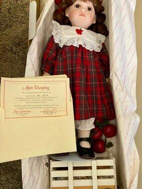 Porcelain Doll in Red Plaid Dress